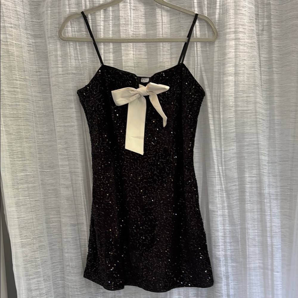 Divided Black Sequin Mini Dress with White Bow